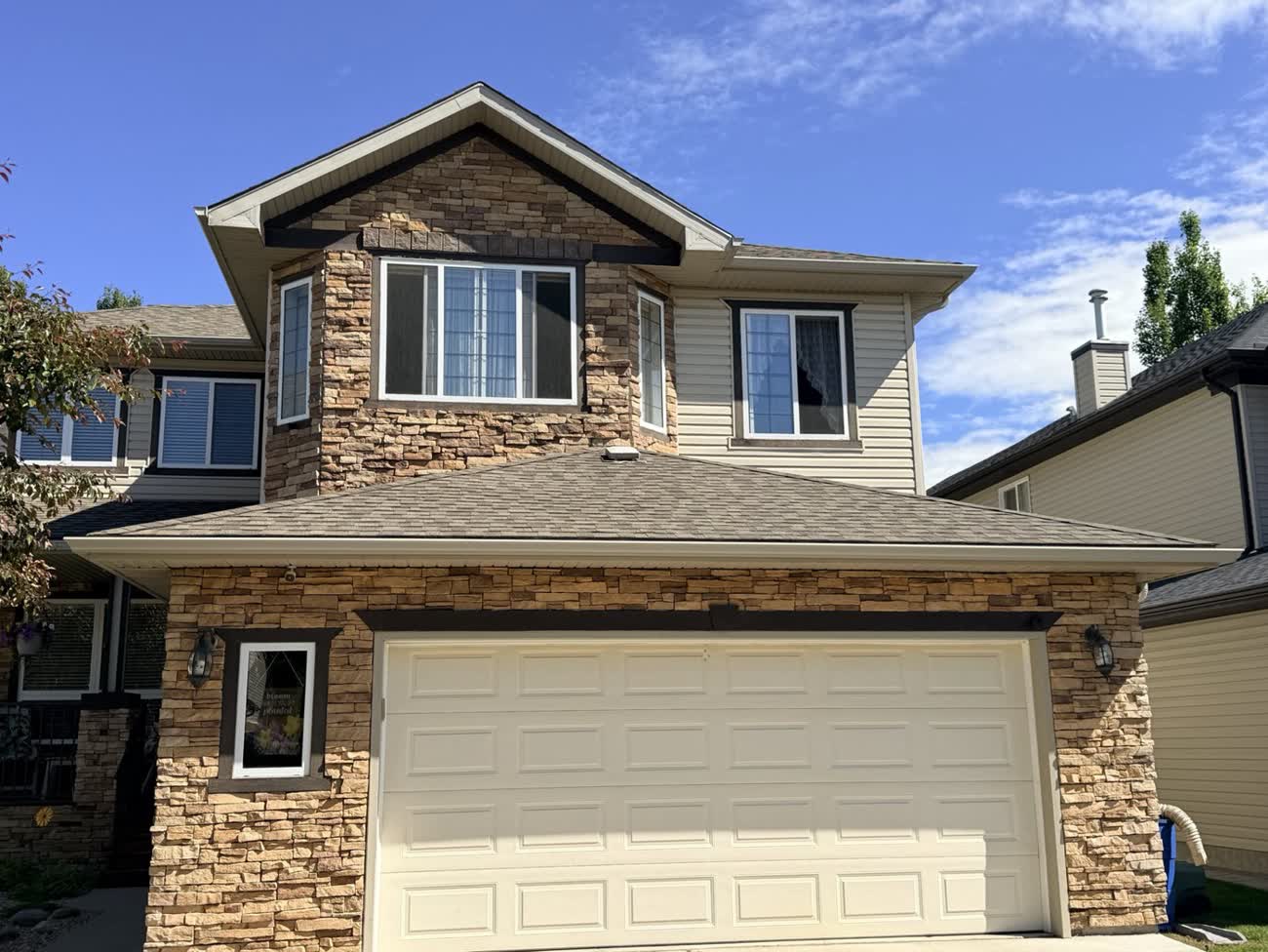 Calgary home with an asphalt shingle roof assessed by Nano Shield