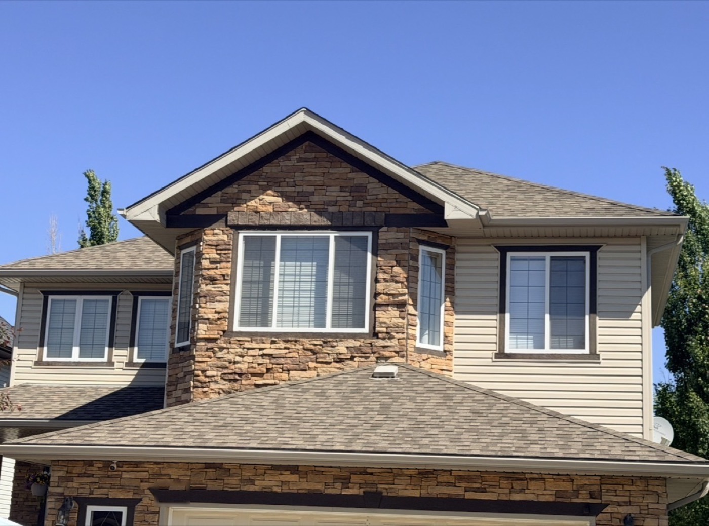 Shingle roof treated by Nano Shield on a Calgary home